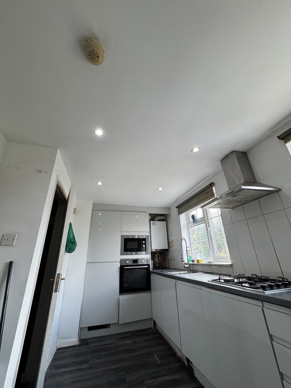 The same kitchen ceiling repaired and redecorated by TLC